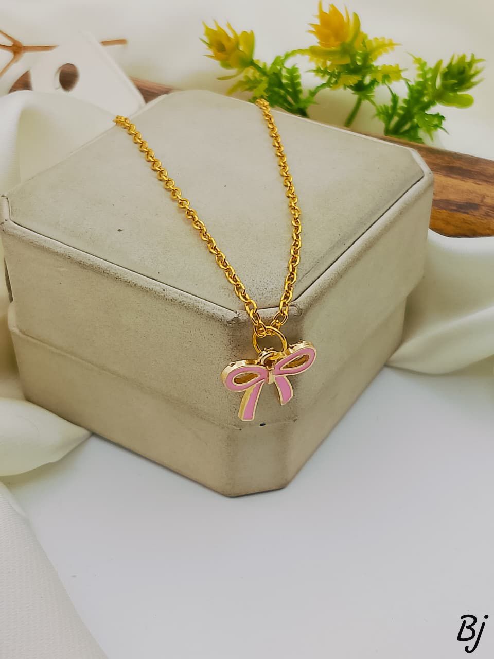 Fancy Beautiful Bow Style Gold Plated Pendants For Her